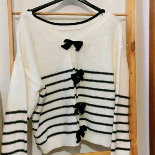 Knitted blouse with bows and silver sequins new, one size