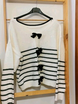 Knitted blouse with bows and silver sequins new, one size