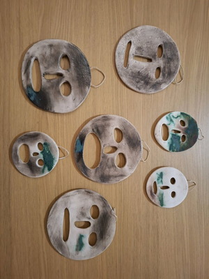 Ceramic faces inspired by Auschwitz horror, set of 7, handmade