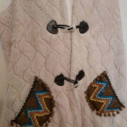 Fur vest used, pale pink with ethnic details, size L
