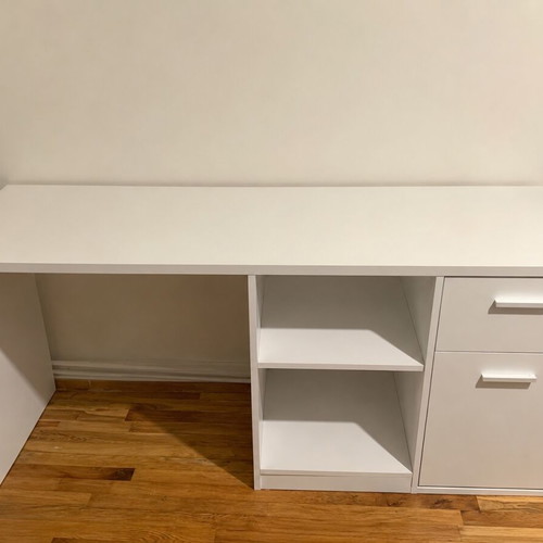 Desk with adjustable shelves, drawer and cabinet