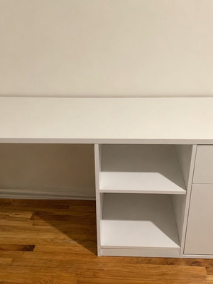 Desk with adjustable shelves, drawer and cabinet