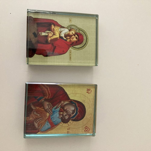 Glass religious icons used, set of two crystal blocks