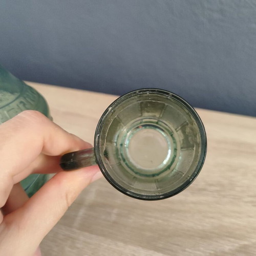 Vintage glass carafe with wine glass used