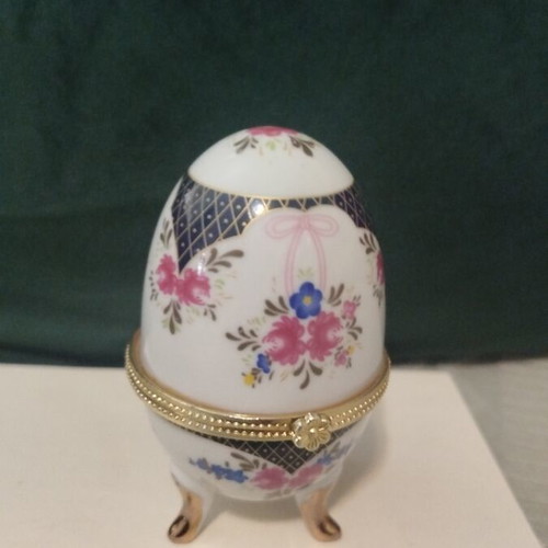 Decorative Faberge-style egg like new with floral motifs