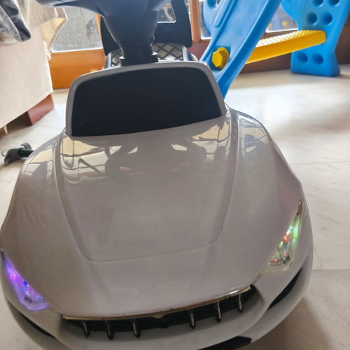 Pedal Car like new, white with lights and music for kids up to 4 years