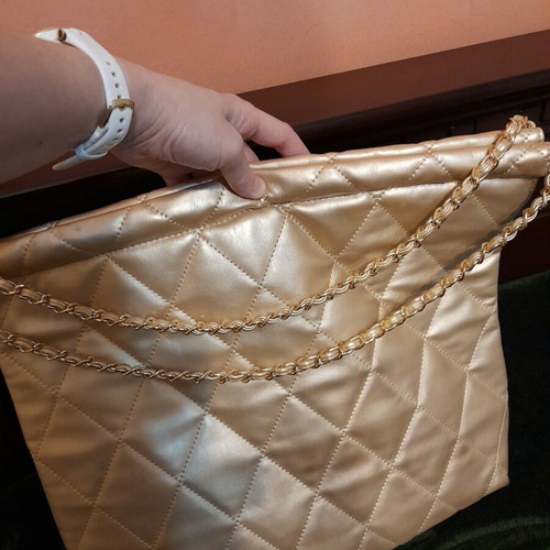 SugarFree shoulder bag like new, quilted gold color