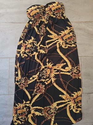 Strapless dress with gold designs used, size medium