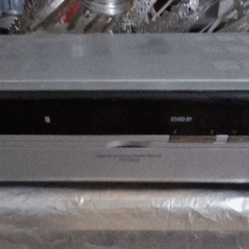 Satellite receiver used with two module slots