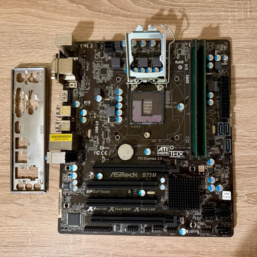ASRock B75M motherboard with 4GB DDR3 RAM used, untested