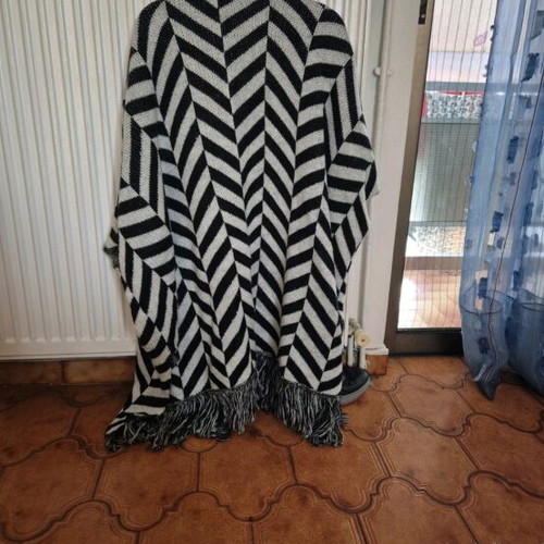 Poncho jacket like new with geometric patterns and fringes