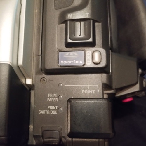 Sony Handycam DCR-TRV820E digital video camera used with printer, battery, charger