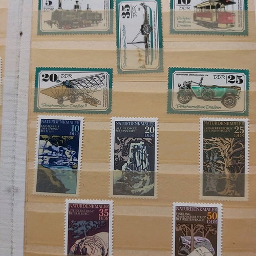 Mini album 16 pages like new with 36 unsealed series from East Germany