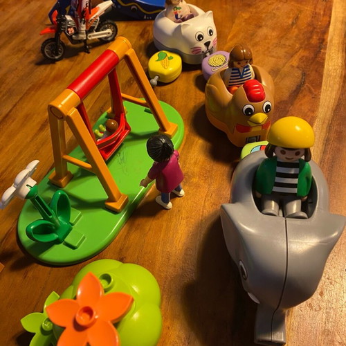 Playmobil playground set with train and motorcyclist like new