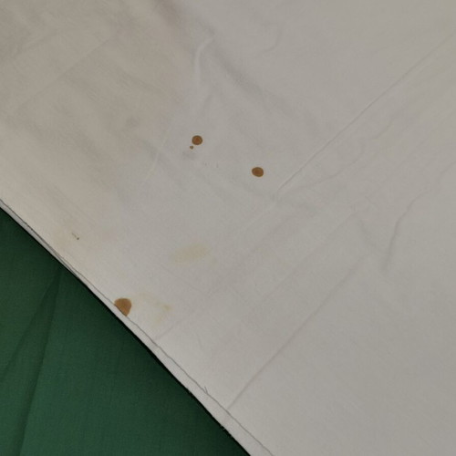 Woven cotton bed sheet used, 1940s vintage with stain