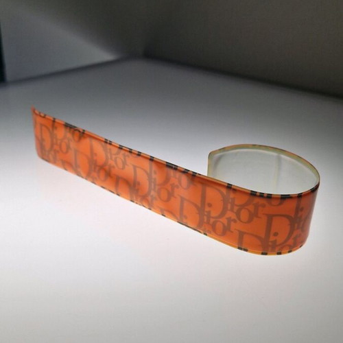 Dior foldable bracelet neon orange used