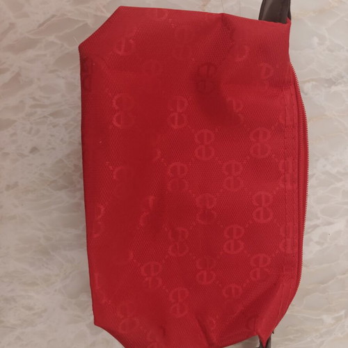 Red embossed cosmetic bag with brown details new