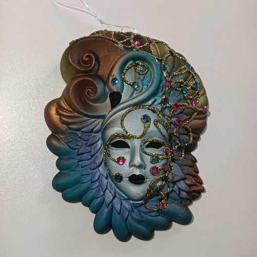 Venetian mask like new with bright colors and unique design