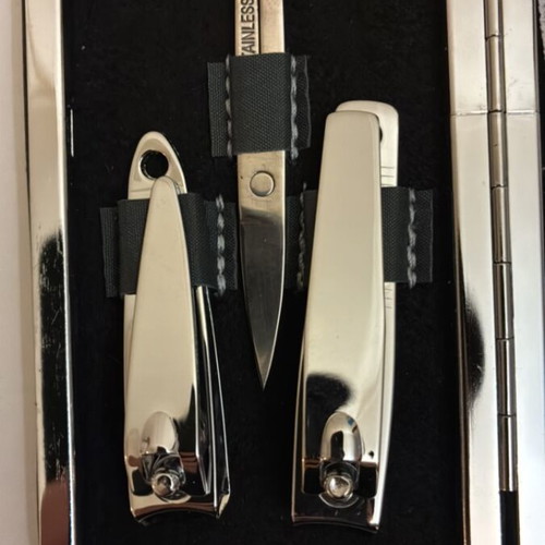 Max Factor nail care set with scissors, clippers, file, tweezers, cuticle tool