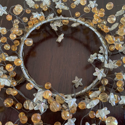 Decorative candle wreaths set of two handmade used with beads and stars