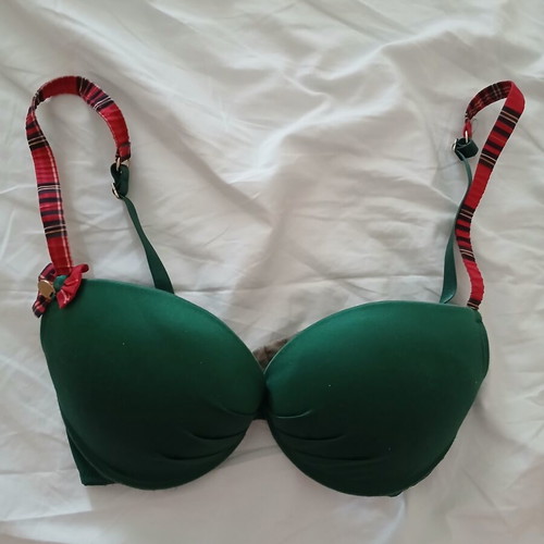 Med 75b bra used, push up with underwire, green