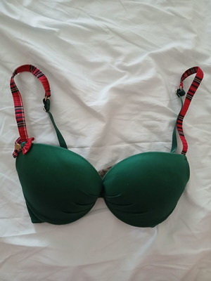 Med 75b bra used, push up with underwire, green