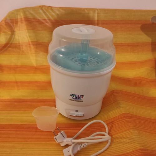 Bottle sterilizer used, capacity for 4 bottles