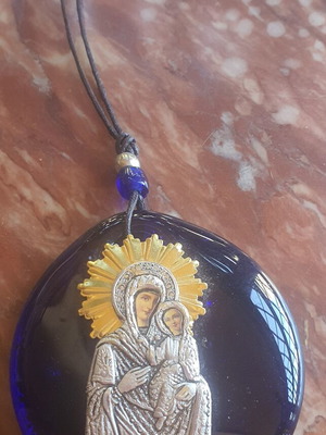 Virgin Mary lucky charm icon