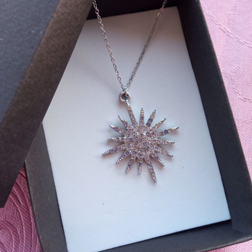 Necklace with silver sun motif, new