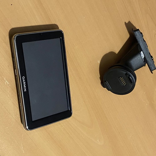 Garmin Move & Fun navigation screen with original dashboard mount like new