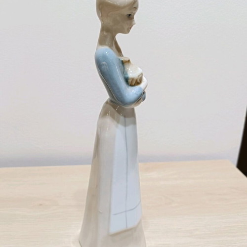 Porcelain figure of young woman like new, height 29 cm