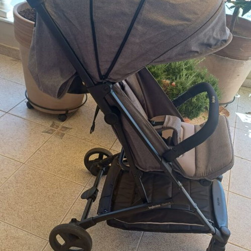 Inglesina Sketch stroller used with Nattou rocking dog gift