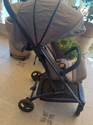 Inglesina Sketch stroller used with Nattou rocking dog gift