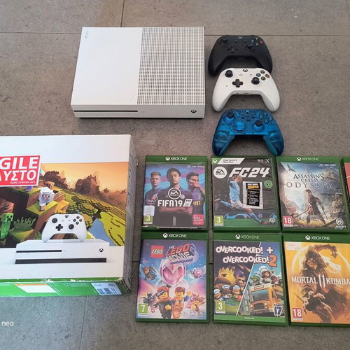 Xbox One S console like new with 3 controllers and games
