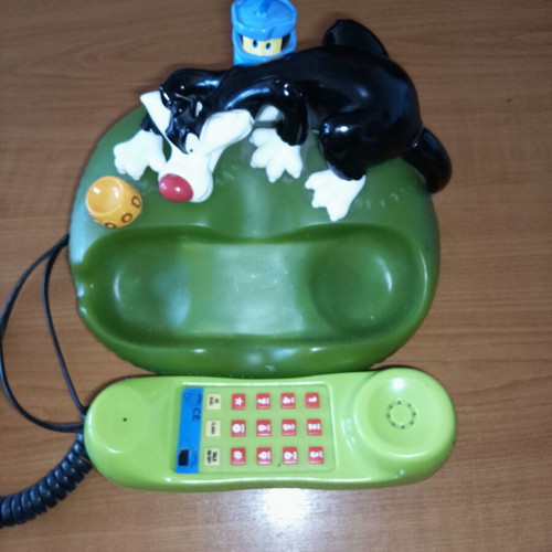 Disney collectible corded home phone used, green