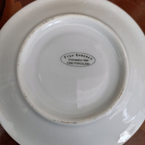 Set of 4 cups with saucers like new