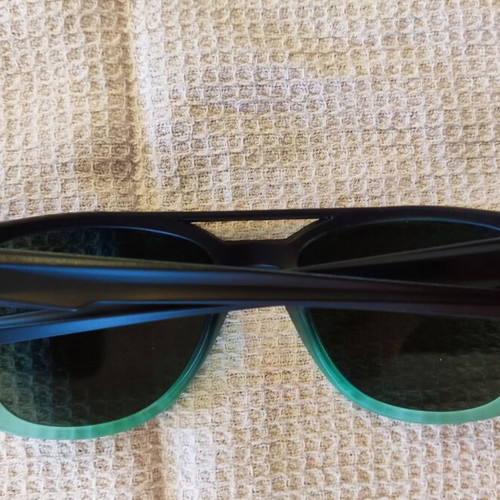 Solo-Solis NDL2709 sunglasses new, transparent green/black frame