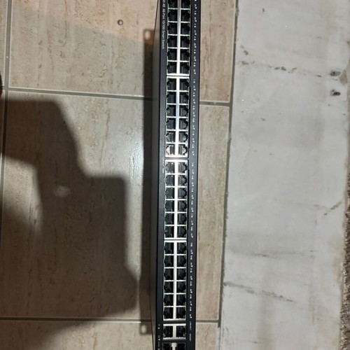 Cisco SF250 48port switch used with 2 gigabit ports and 2 SFP slots