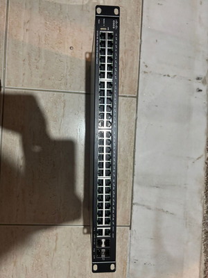 Cisco SF250 48port switch used with 2 gigabit ports and 2 SFP slots