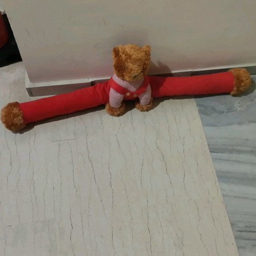 Door draft stopper teddy bear used