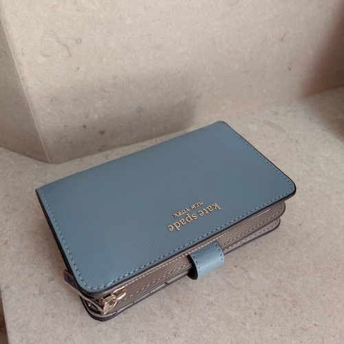 Kate Spade wallet new, turquoise with multiple card slots