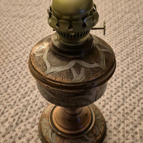 Brass antique oil lamp used with decorative engravings