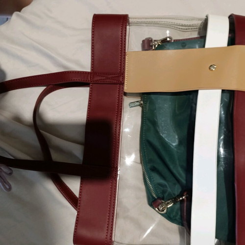 Axel handbag like new with detachable pouch