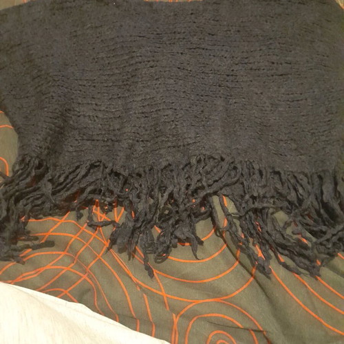 Black women's knitted top with fringes used
