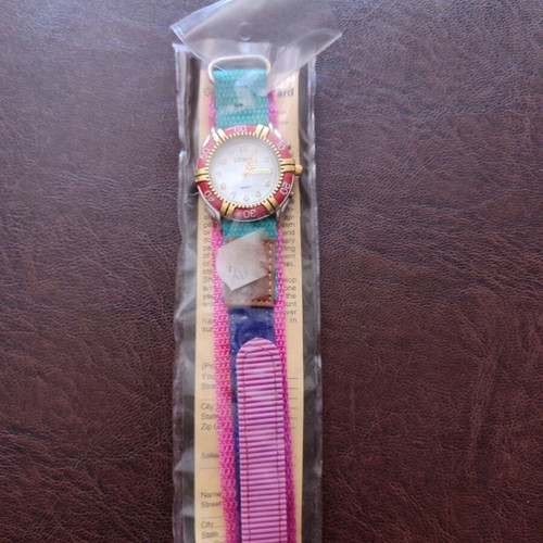 Vintage wristwatch new with metal dial and luminous hands