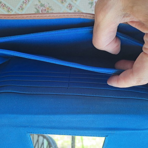 Large striped clutch bag used, blue and brown