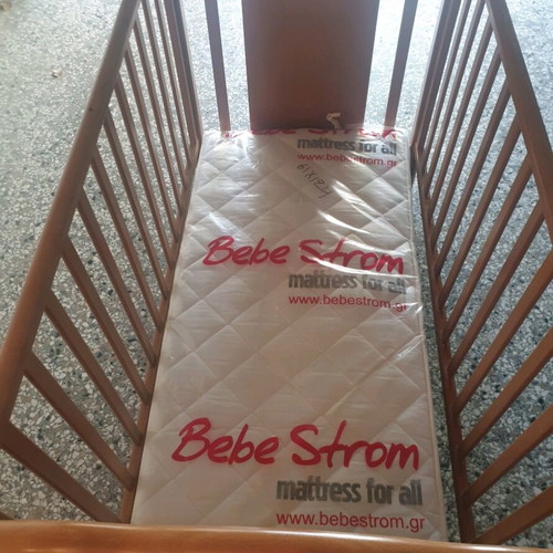 Wooden cot with mattress like new, barely used