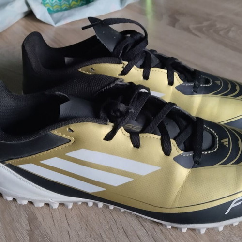 Adidas Messi football shoes, black and gold