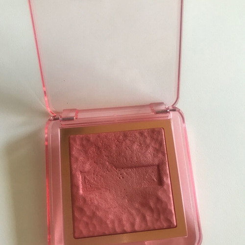 Nabla skin glazing blush lightly used, bright peach pink highlighter