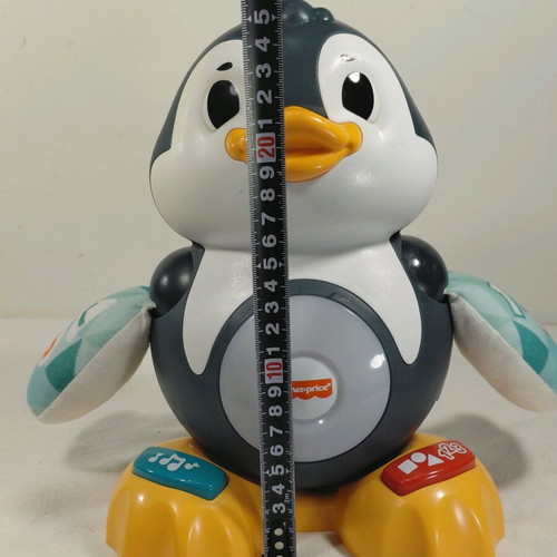 Fisher-Price Penguin Toy used, sounds work but no body movement